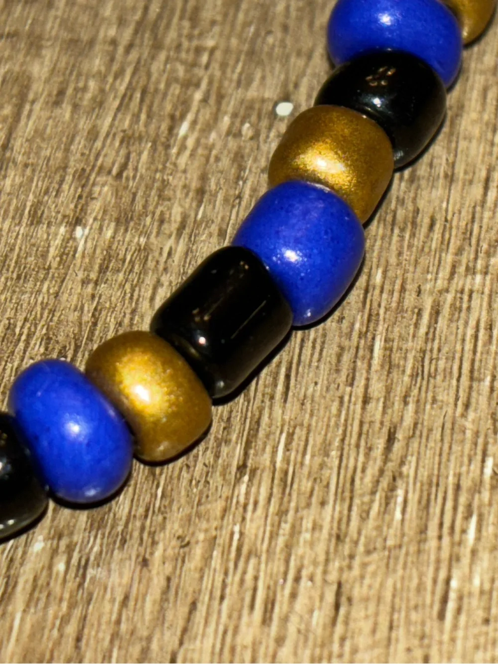 Handmade Blue, Black & Gold Beaded Bracelet with Heart Accent